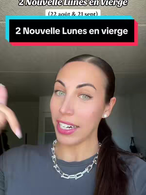 The cover image features a woman with long brown hair and green eyes. Above her head are two text boxes with the text "2 Nouvelle Lunes en Vierge" and "(22 août & 21 sept)". She is smiling with a slight tilt of her head, and her right index finger is pointing slightly downward. The background is a bit blurry but appears to be an indoor setting.