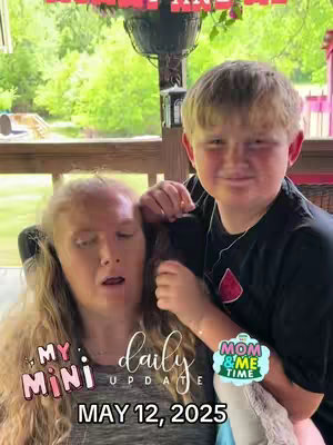 A woman and a young boy are sitting down on a porch and looking towards the camera smiling. Text overlays state 'MY MINI', 'daily UPDATE', 'MAY 12, 2025', and a badge that says 'MOM & ME TIME'.