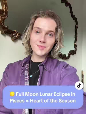 The cover image features a young man with long blonde hair, wearing a purple jacket and a necklace. He is smiling slightly at the camera. Behind him is a decorative mirror with a gold frame. The background is a plain wall. A text overlay at the bottom of the image highlights the theme of the video.