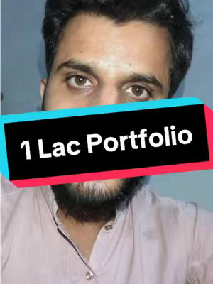 A selfie of a man with a beard looking at the camera. Overlaid on him is a rectangular text box that reads "1 Lac Portfolio" in white text, with a blue and red gradient background.