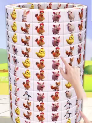An image of a cylindrical structure showcasing a puzzle game with cartoon animals on a grid, being interacted with by a hand. The cylindrical structure is made of segments each containing multiple tiles with cartoon animal images. A hand, appears to be selecting or interacting tiles on the structure.
