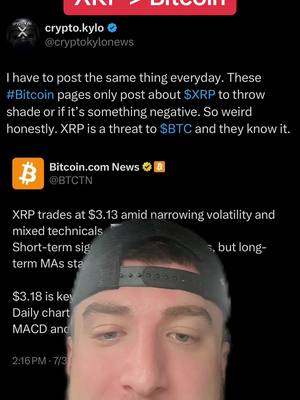 A selfie-style shot with a man looking down at the camera. He has a black cap on and is positioned in front of what appears to be a screenshot of a tweet or social media post. The background is black, emphasizing the details of the social media interface and the man's face.
