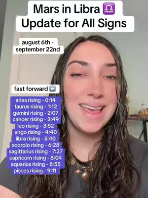 A woman with long, dark hair is centered in the frame, smiling at the camera. Text overlays are positioned at the top and bottom of the frame. The background appears to be a room with simple decor.