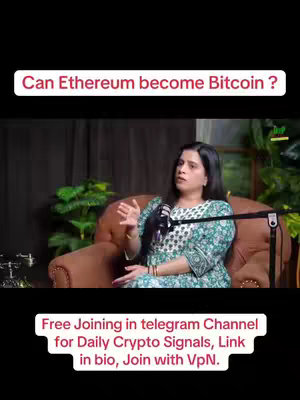 The image shows a woman seated in a comfortable chair, likely in a studio setting, addressing the camera. The background suggests a podcast or interview setup, with subtle greenery adding some visual interest. Text overlays provide context and a call to action, promoting a Telegram channel for crypto signals. The overall composition is well-lit, with the woman as the central focus, conveying a professional yet engaging tone.