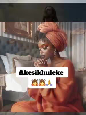 The image shows a woman in an orange turban with her hands clasped in front of her face in a praying position. She is in what appears to be a bedroom setting, with a blurred figure in the background and fancy headrest of the bed. A text overlay reads, "Akesikhuleke," with emoji icons of two people and praying hands beneath it.