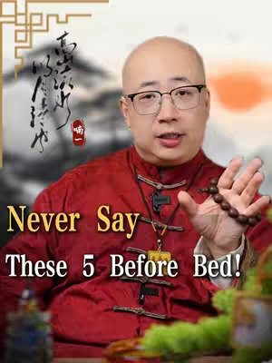 A man with glasses and a bald head is the central figure, dressed in a red traditional shirt. He is holding a string of beads in his right hand and gesturing with his open left hand towards the viewer. Text overlay in yellow says 'Never Say These 5 Before Bed!'. The background includes blurred imagery, possibly a landscape with Chinese calligraphy.