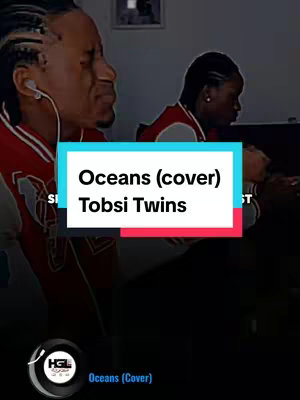 The cover image shows two men, seemingly twins, singing and recording music. The image is vertically oriented. The men are wearing matching red and white varsity jackets. A text overlay in a turquoise rectangle identifies the song as "Oceans (cover)" by "Tobsi Twins". Behind the men appear to be recording equipment and studio space. The lighting seems to be artificial.