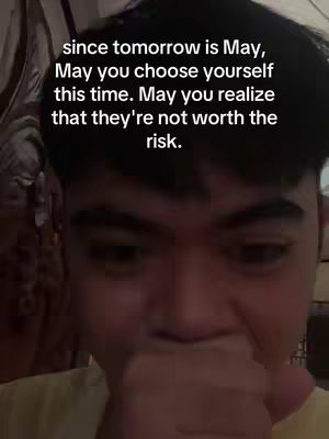 A close-up shot of a young man's face, partially obscured by his hand covering his mouth. Above him, overlaid text provides motivational messages. The lighting is somewhat dim, with a focus on the subject's eyes, while the text uses a simple, white font against a dark background.