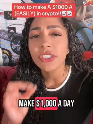 A woman with long, wavy, dark hair looks towards the viewer, a red banner at the top contains white text that reads "How to make A $1000 A (EASILY) in crypto!!" along with upward trending graph icons. A lower banner "MAKE $1,000 A DAY" in a box that is red with white text.