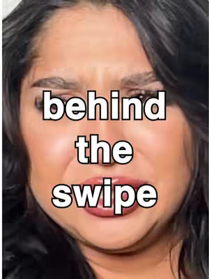 The cover image is a close-up of a woman's face, focusing on her expression. She has dark hair and is positioned in the center of the frame. The text overlay is in white font with a black border, which is "behind the swipe". The overall composition points to drama and dating.