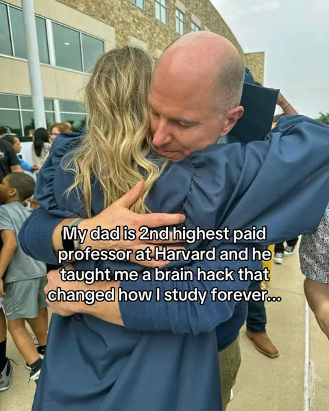 A photograph captures a heartwarming moment between a blonde woman and a man, presumably her father, hugging closely. The woman's blonde hair is visible down her back as she embraces the man, who is balding on top and wearing a light-colored shirt under a dark blue jacket. The focus is primarily on their embrace, suggesting an emotional and intimate relationship. The background includes a building and other individuals, contributing context to the scene, possibly a graduation or celebratory event. Text overlays the image.