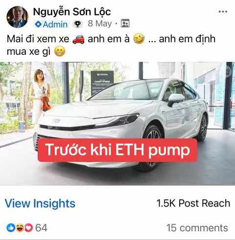 The cover image showcases a white Toyota Camry hybrid car parked inside a showroom setting. In the background, a woman in a white dress is playing violin. A red banner with white text overlays the image.