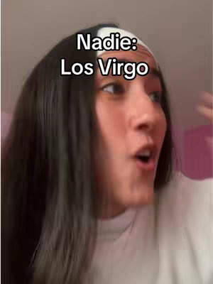 A woman is in the frame, looking off-camera with a surprised expression. She has long, dark hair with a headband, and the text overlay reads 'Nadie: Los Virgo'.