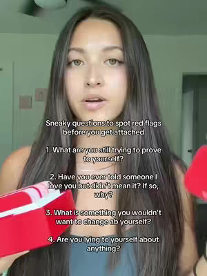 A woman with long dark hair and fair skin looks directly at the camera. Text about spotting red flags is overlaid, along with four questions designed to elicit revealing answers from a dating partner, as well as a red box held in one hand and another out of frame.