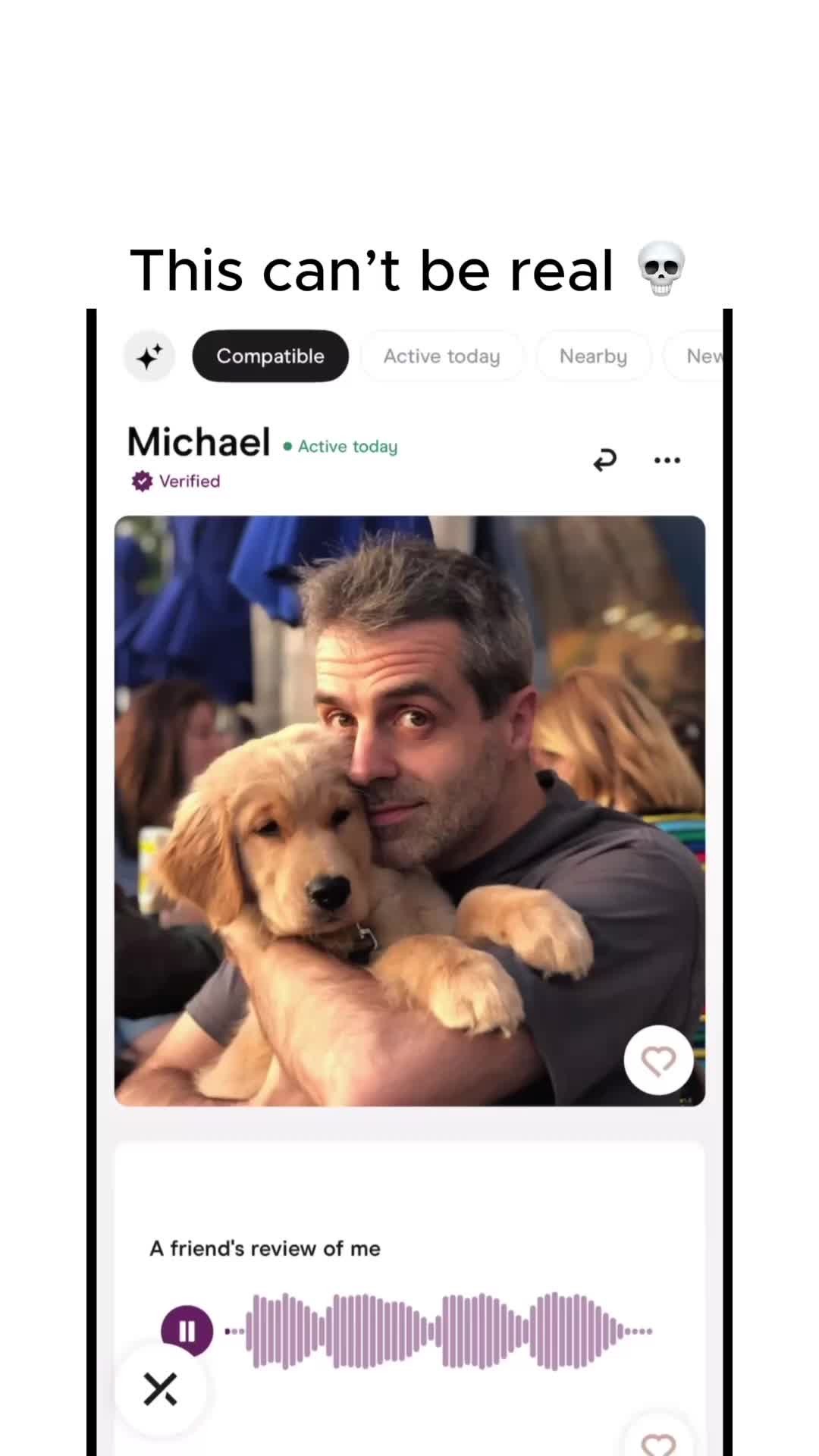The image is a screenshot from a dating app, showcasing a man holding a golden retriever puppy. The man is fair-skinned with short, graying hair, smiling, and appears to be outdoors. Overlaid text reads "This can't be real 💀". The app interface includes options like "Compatible," and "Active today," with an added review section below with an audio wave graph.