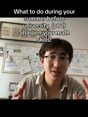 A young man with glasses is centered in the frame, gesturing with both hands as he speaks. Behind him, a whiteboard and framed artwork are visible, suggesting a home or office setting. The image uses natural lighting and a medium shot to focus on the man's expression and message.