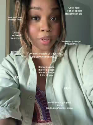 A selfie-style shot featuring a light-skinned woman in a light green button-down shirt layered over a patterned top. Her face takes up most of the frame, with text overlays scattered around her head and body. The background appears to be an indoor space.