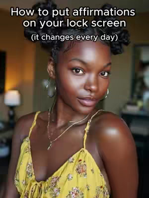 A woman with dark skin and curly hair styled in two buns is the main subject. She's wearing a yellow floral dress with a low neckline and hoop earrings. Text overlays at the top: 'How to put affirmations on your lock screen', with an additional: '(it changes every day)'. The background is blurred, showing a room with a window and a lamp.