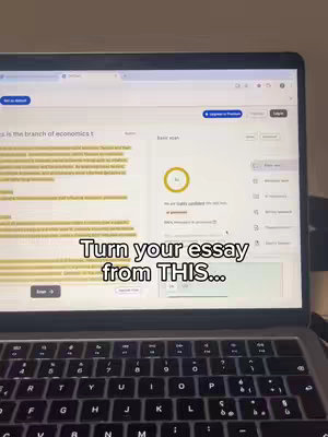 A laptop screen displaying text highlighted in yellow, suggestive of an essay scanned for AI detection. Below the screen, a laptop keyboard is visible. The caption 'Turn your essay from THIS...' is overlaid on the image.