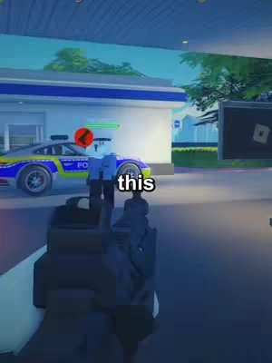 A first-person view from a Roblox game. The immediate foreground shows the black barrel of a virtual gun. Beyond, an avatar stands in a street with a police car, gas station signs visible, and a blue sky. A white text box with the word “this” is overlaid.
