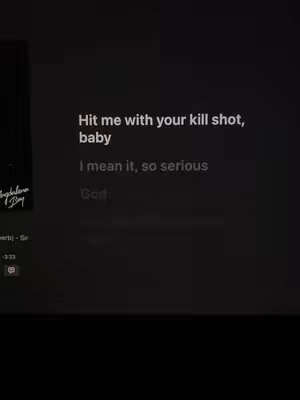The image shows lyrics from a song on a dark background, presumably a screenshot from a music streaming app. Lyrics are white on the dark background.