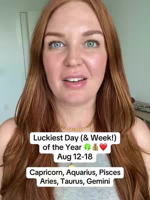 A woman with long auburn hair and light skin smiles directly at the camera. Overlaid on her image is a white box with text in a black font, including the words "Luckiest Day (& Week!)," dates, and the names of zodiac signs.