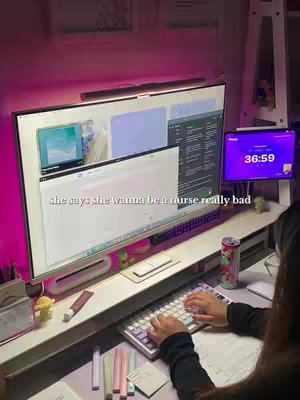 The cover image shows a person at a desk with a computer, monitor, and other office supplies. The monitor displays a webpage with text and images. A small tablet shows a timer. The person is typing on a colorful keyboard. A can of soda and some pens are visible on the desk.