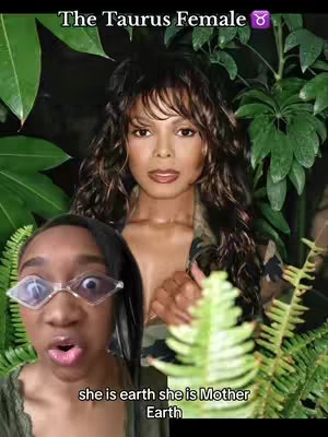 The cover image features a composite of two women and lush greenery. In the foreground is a woman with wide eyes and diamond-shaped glasses, seemingly surprised, her open mouth expressing a reaction. Behind her, a posed image of another woman is seen, with long, flowing hair and a neutral expression, standing between green foliage and a dark background. Text overlays the image, adding context.