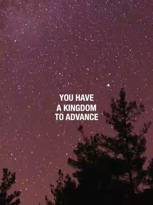 A night sky image with a deep purple hue, filled with numerous stars. Two pine trees are silhouetted at the bottom of the image. Bold white text appears, reading 'YOU HAVE A KINGDOM TO ADVANCE'.