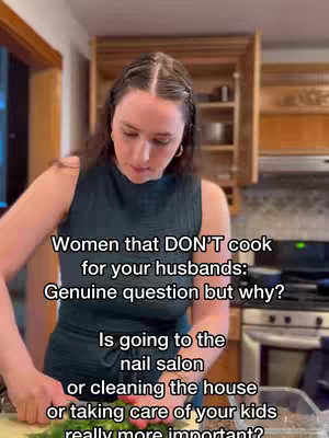 A woman in a dark green top is in a kitchen setting with wooden cabinets. She is holding a knife and cutting food. The text overlayed on the image include a question about women cooking for their husbands, and what's more important: housework, salon or taking care of the kids.