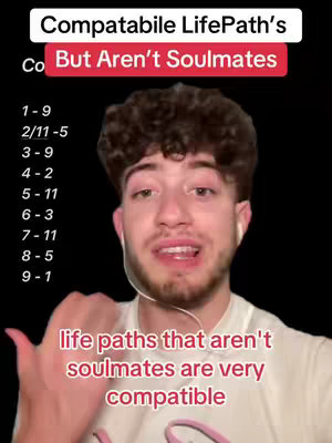 A young man with short dark hair and a short beard is centered in the image, against a plain black backdrop. Above him is a red banner with white text that says 'But Aren't Soulmates'. There is text on the screen, listing LifePath numbers.