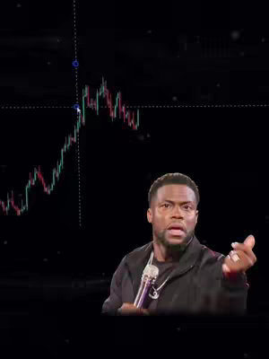 The image shows Kevin Hart reacting with a concerned expression while a stock chart is overlaid behind him. He appears in a black jacket with a silver necklace and a microphone, seemingly in a dark studio.