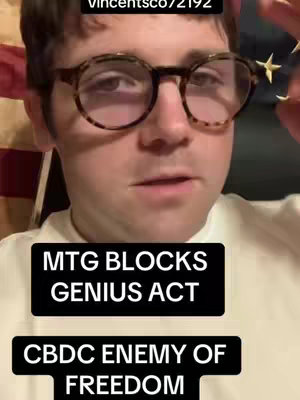 The cover image is a selfie-style shot of a man wearing glasses. Text overlays appear in black boxes on the bottom part of the screen. The background seems to include elements of a striped flag, with red, white, and blue colors.