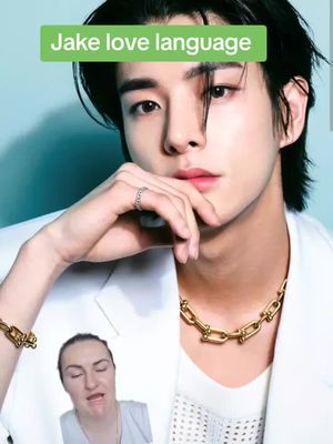 The image shows a close-up of a young man with dark hair styled back. He's wearing a white jacket and a gold chain necklace and bracelet. Overlaid on the image is a text box that says "Jake love language."