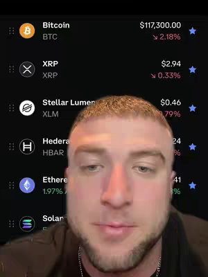 A selfie-style image with a man's face in the foreground and a cryptocurrency price tracking interface as a background. The man is looking at the camera, and the background shows a black interface displaying the current prices and fluctuations of different cryptocurrencies. The top of the interface shows Bitcoin's current price. The manβs face dominates the bottom half while crypto info is displayed in the upper-left.