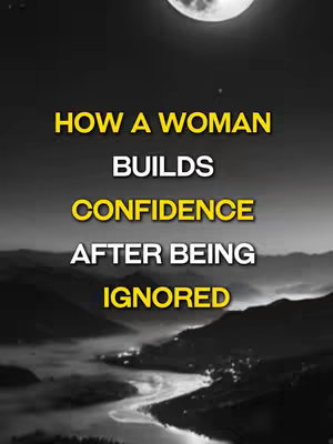 The cover image features a scenic, dusk or night landscape. In the backdrop, dark mountains are silhouetted against a sky. In the middle, it is a foggy valley in black and white. The moon is placed at to the top of the image. Overlaid on this scene is a text overlay in a clear, bold font that reads: "HOW A WOMAN BUILDS CONFIDENCE AFTER BEING IGNORED".