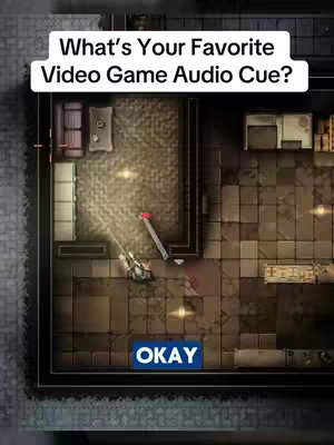 The image is a top-down view of a video game environment. A tiled floor area features a figure with a longsword, a couch, a table and what seem to be storage boxes. Near the sword, there is a flat rectangular blue box with "OKAY" written in white capital letters. The text overlay "What's Your Favorite Video Game Audio Cue?" appears at the top of image.