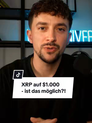 A man with short brown hair and a beard is centered in the frame. He is speaking directly to the viewer. Below him is a white rectangular text box. The background includes a glimpse of shelves and a blurred blue neon sign. The composition is well-lit, and the man is wearing a black shirt.