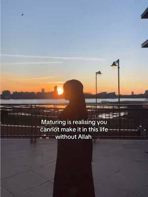 A silhouette of a person in a hijab at sunset with a quote overlay.