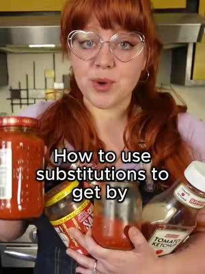 The cover image features a woman with red hair and glasses holding jars of tomato sauce and ketchup, set against a kitchen backdrop.