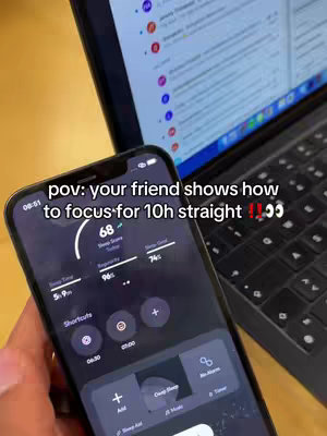 The cover image showcases a smartphone displaying an app interface, positioned in the foreground. Behind it, a laptop screen is partially visible, displaying a list of email notifications. The smartphone shows a focus or time management app, visually indicating how to stay focused. The layout is clean and modern, with a bright screen contrasted against the dark background. The overall composition suggests productivity or focus-related content, with the text overlay setting the context for the video's theme.