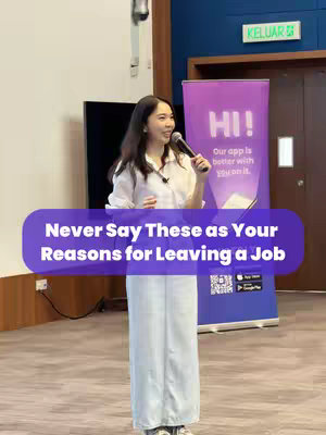A woman stands on a stage, holding a microphone, speaking in front of an audience. Above her, there is a large purple speech bubble overlay that says "Never Say These as Your Reasons for Leaving a Job." Behind her is a stand with a logo that says "Hi". The overall color palette is bright.