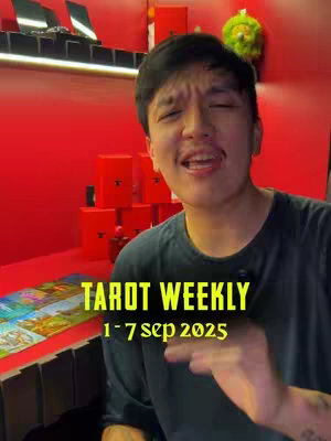 A man is centered in the frame, looking directly at the camera while speaking. The primary background is a red wall. Overlayed on the image is white text that states 'TAROT WEEKLY' and the date '1 - 7 sep 2025' in the image's center. A table is present in the foreground on which tarot cards are placed.