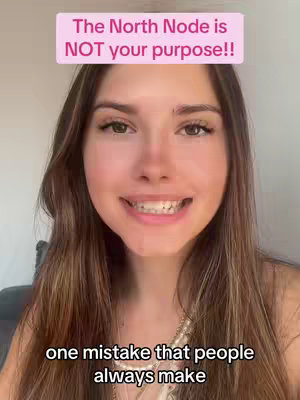 A selfie-style video of a woman in the center frame smiling. She has long brown hair and is wearing a necklace. Above her head is a pink rectangular bar containing text. Below her is another bar, it's white and it states 'one mistake that people always make'
