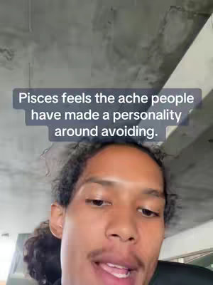 The cover image features a man with curly hair and a mustache, centered in the frame with a grey, textured background. Text overlayed in a rectangular box reads: Pisces feels the ache people have made a personality around avoiding.