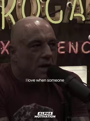 The cover image features a bald, fair-skinned man talking into a microphone. The background is blurred but seems to be a podcast studio.