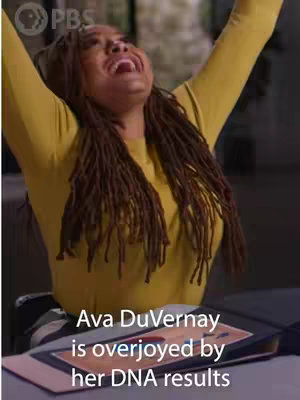 The cover image shows Ava DuVernay with arms raised in the air, mouth wide open with joy. She has dreadlocks and is wearing a yellow long-sleeved shirt. The background is a blurred office setting. Below her, the text 'Ava DuVernay is overjoyed by her DNA results' is overlaid at the bottom.