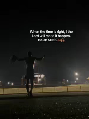 A silhouette of a person standing with arms raised, silhouetted against a dark night sky. Text overlays the image, offering a quote from Isaiah 60:22.