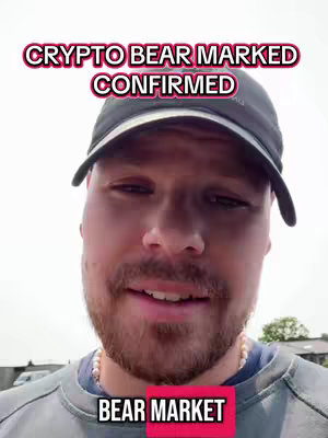 A man with a beard and a cap is looking at the camera with text overlays: "CRYPTO BEAR MARKED CONFIRMED" above his head.