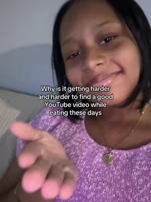 A close-up shot of a young woman smiling at the camera. The woman is wearing a pink, patterned top and a gold necklace, and a text overlay appears to the left of her face.